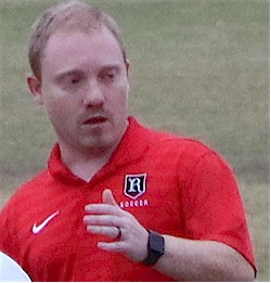 Coach McKinnon Pennell addresses team after SAA semifinal win over Sewanee